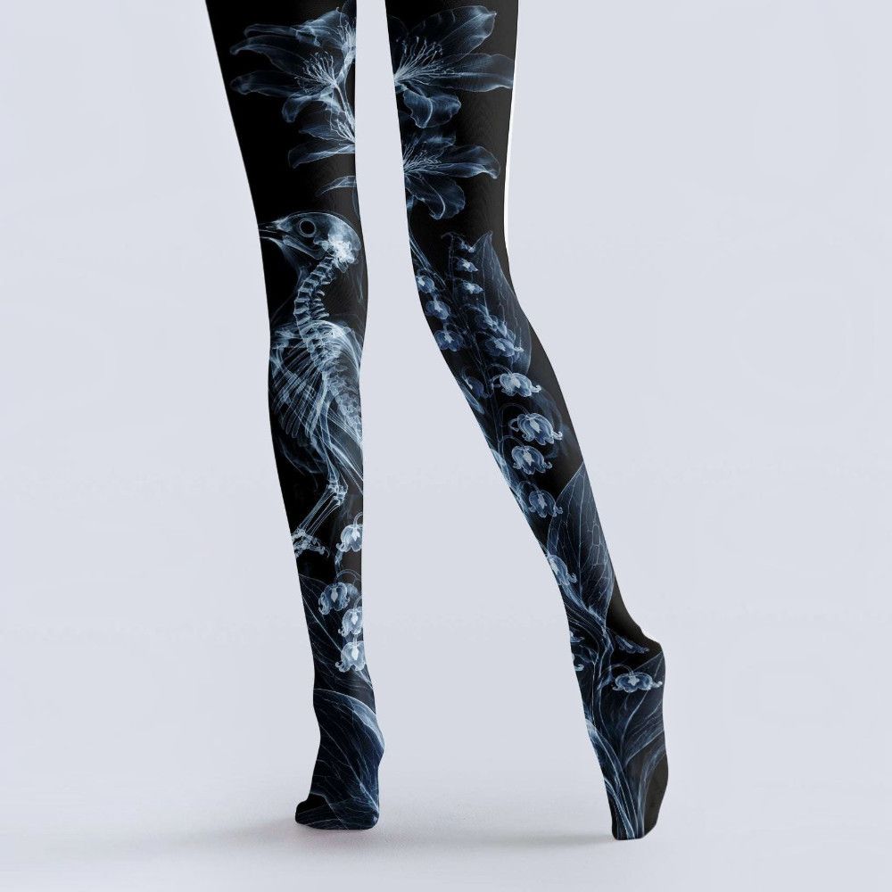 Avaeri black tights featuring see-through X-ray style prints of flowers and bird skeletons, crafted from comfortable stretch fabric, are ideal for dark romantic style outfits.
